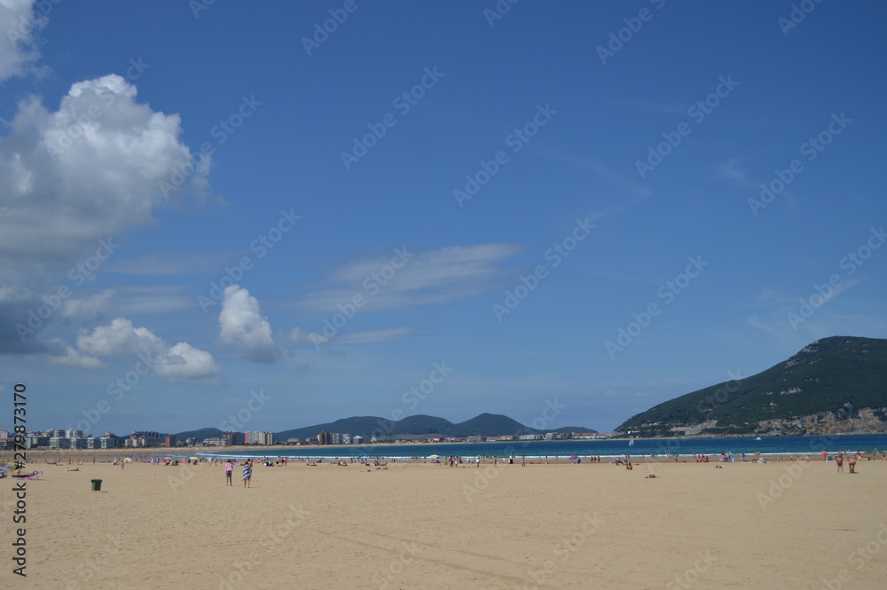 Beautiful Long And Wide Beach In Laredo. August 27, 2013. Laredo, Cantabria, Spain. Vacation Nature Street Photography.