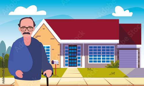 old man standing next house exterior