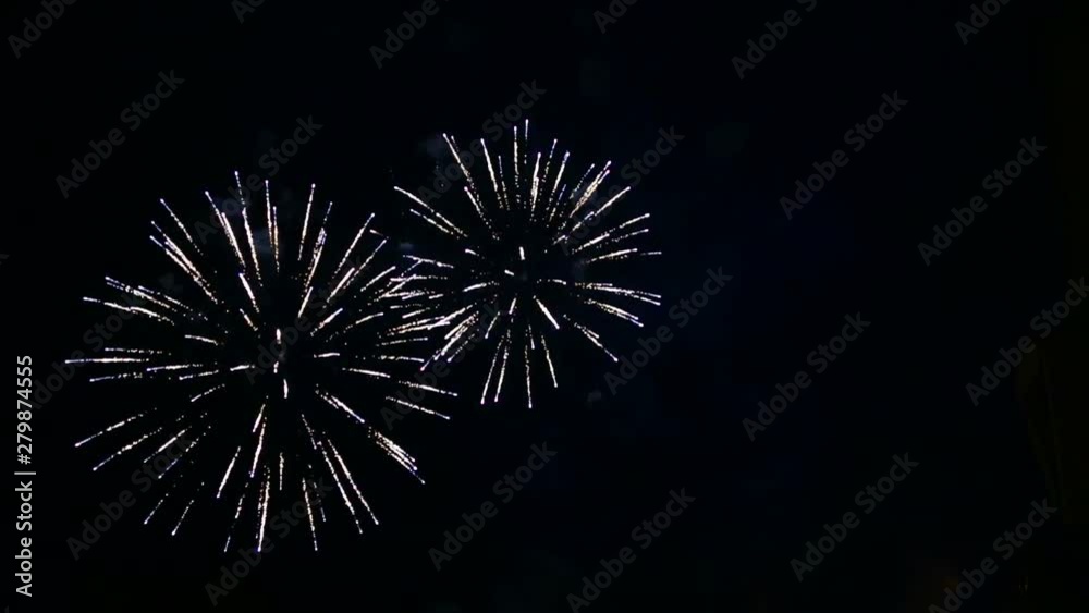 Spark flashes of festive fireworks in the night sky Spark flashes of festive fireworks in the night sky