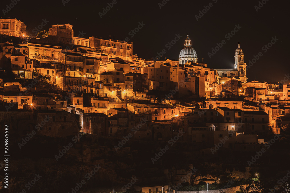Night experience in old baroque sicilian town Ragusa in Sicily, south Italy