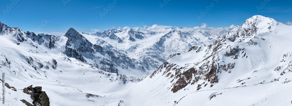 Panorama of the winter snowy mountains at Stubai glacier ski region in Austria.