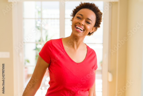 Free Download Beautiful young african american woman smiling confident to the camera showing teeth - GFXLoad