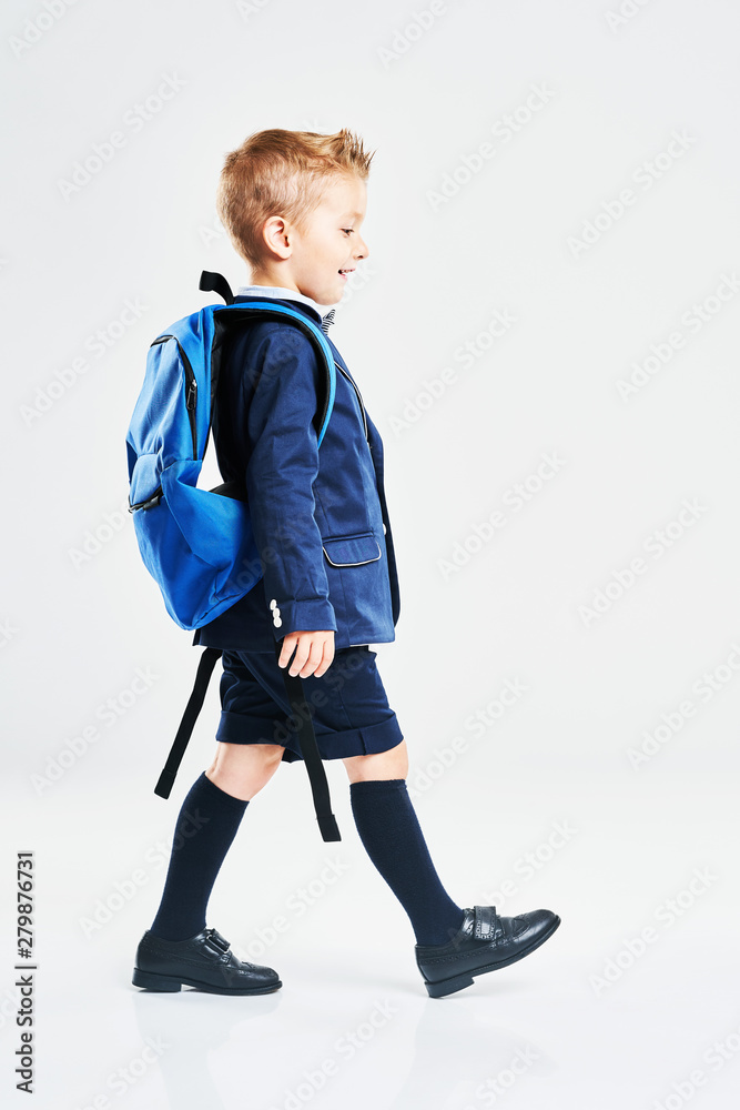 Portrait of a boy ready to school isolated on white Portrait of a boy ready to school isolated on white