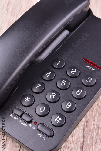 Black Telephone on wooden table