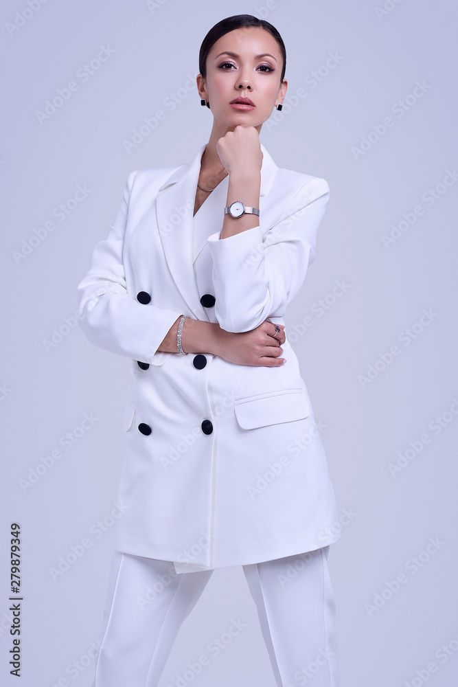 Gorgeous latin women in fashion white suit Gorgeous latin women in fashion white suit