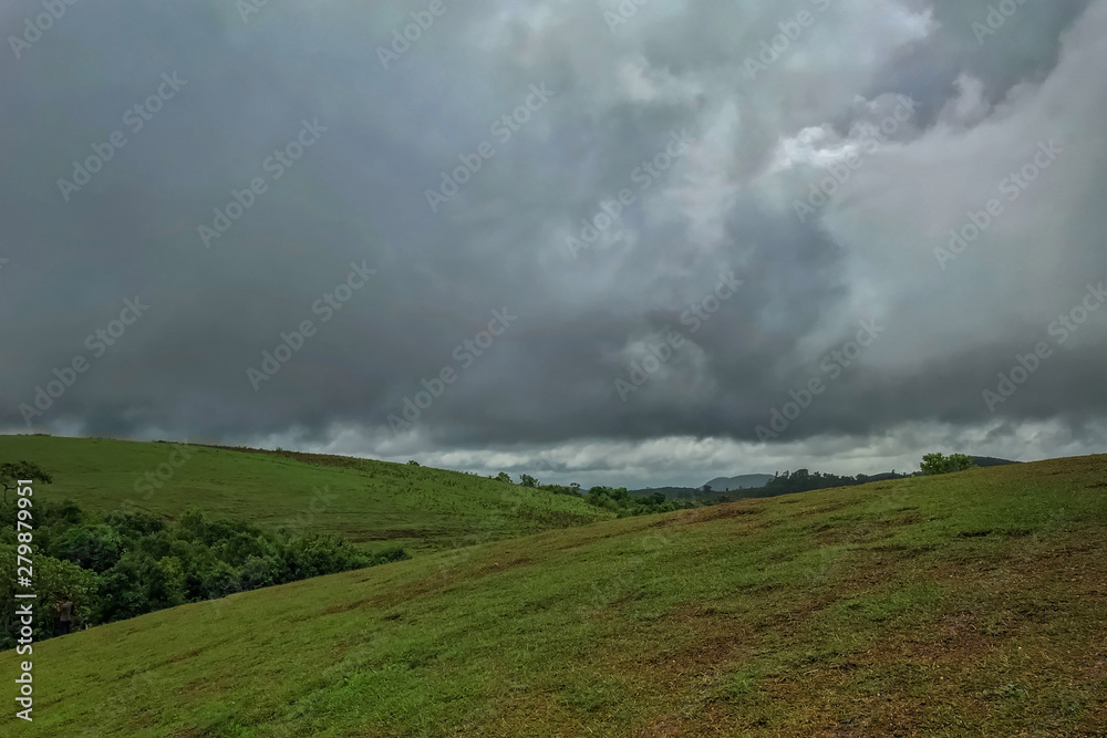 Beautiful morning view of Vagamon Meadows and sky Beautiful morning view of Vagamon Meadows and sky