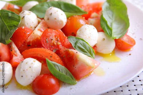 Italian caprese salad with tomatoes and mozzarella