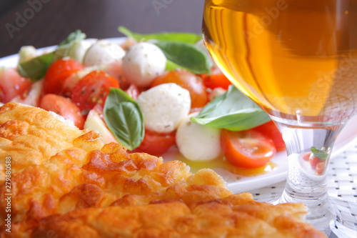 Italian caprese salad with tomatoes and mozzarella