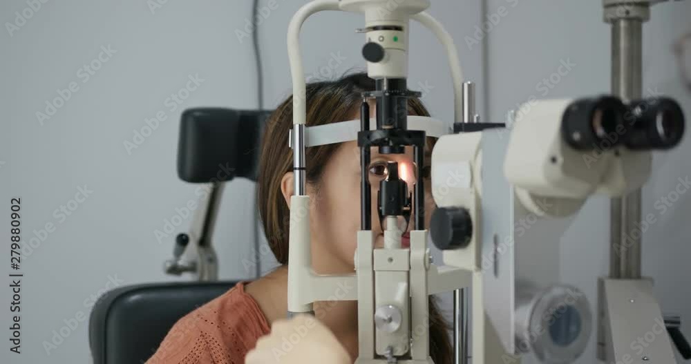 Woman check on eye in clinic