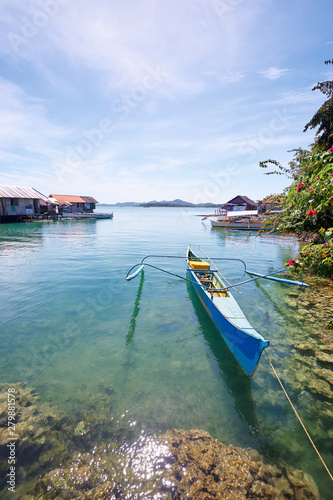 Fototapeta Naklejka Na Ścianę i Meble -  Beautiful landscape with blue sea, tropical islands and fishing houses on stilts in mangrove lagoon, Siargao Island, Philippines.