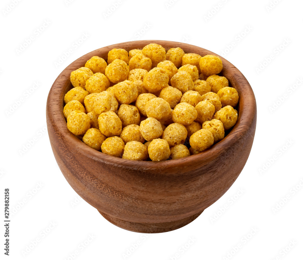 Corn balls flakes in wooden bowl isolated on white background Corn balls flakes in wooden bowl isolated on white background