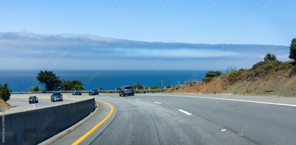 Pacific Ocean fog bank seen from Highway 1 traveling towards Pacifica south of San Francisco. Pacific Ocean fog bank seen from Highway 1 traveling towards Pacifica south of San Francisco.
