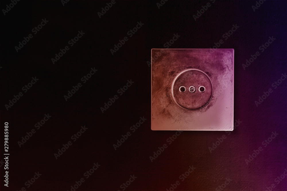 Old european electrical outlet. Dark background. Cracks and scuffs. Violet toning. Electric industry concept. Old european electrical outlet. Dark background. Cracks and scuffs. Violet toning. Electric industry concept.