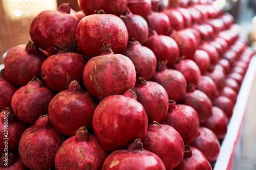 Group of pomegranates. Pomegranate closeup, background.