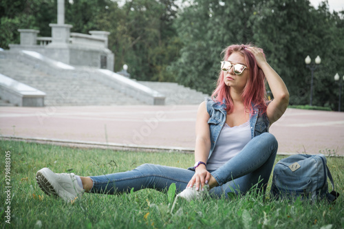 modern hipster stylish girl enjoying a warm summer day outdoors © bisonov