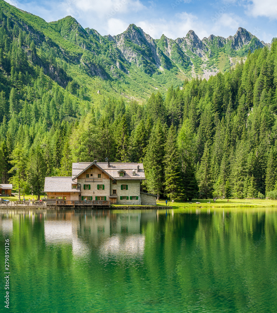 Idyllic landscape at Lake Nambino, near Madonna di Campiglio. Province of Trento, Trentino Alto Adige, northern Italy. Idyllic landscape at Lake Nambino, near Madonna di Campiglio. Province of Trento, Trentino Alto Adige, northern Italy.