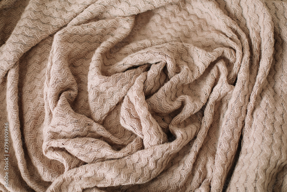Fabric texture background. Wrinkled, crumpled fabric. Closeup textile background. Knitted texture pattern.  Soft focus