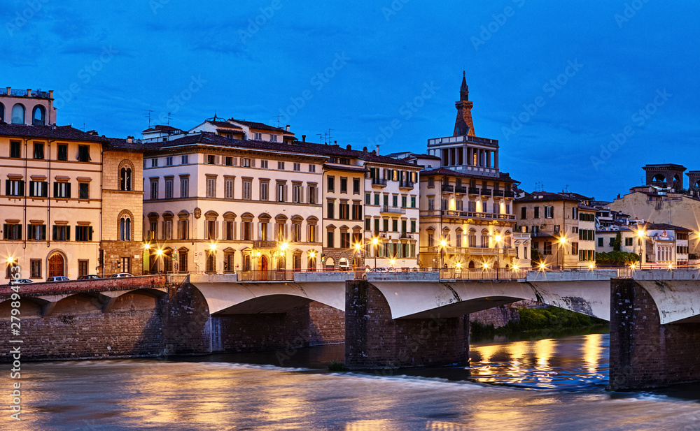 Panorama view to ancient bridge at river Arno in Florence old town, famous touristic place of Tuscany region, Italy.