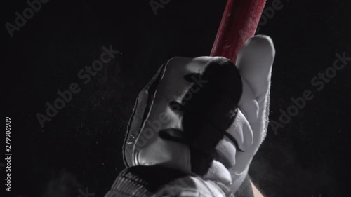 Close up of hands on a baseball bat, slow motion