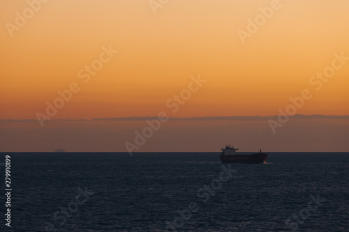 Ship sailing in the Mediterranean sea at sunset © Gianluca