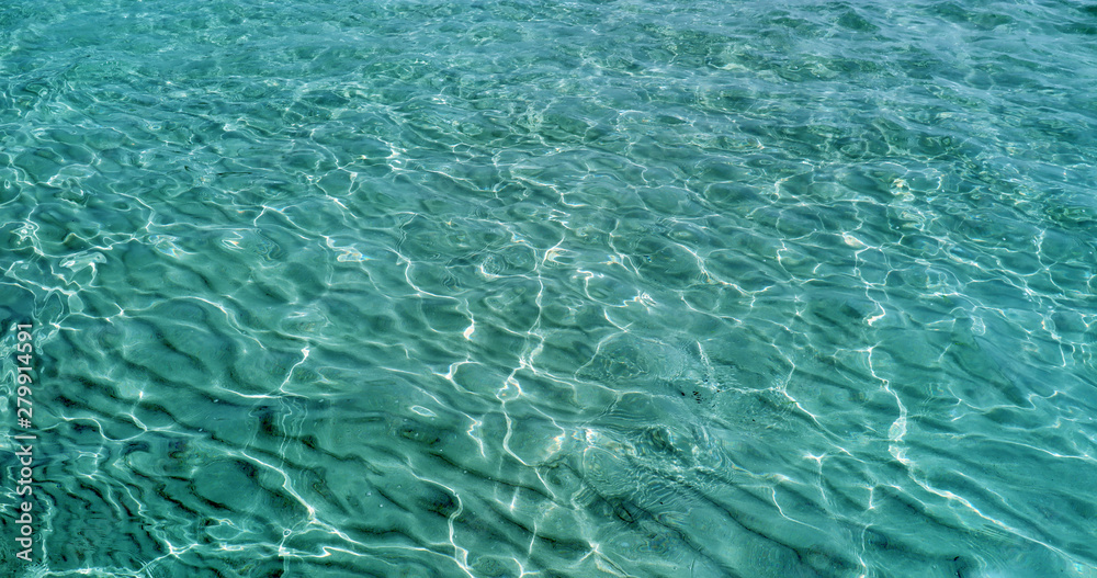 Turquoise water in South of Europe during Summer. Waves in this clear fresh warm water. Turquoise water in South of Europe during Summer. Waves in this clear fresh warm water.