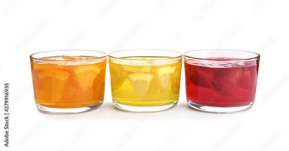 Tasty jelly desserts in glasses on white background Tasty jelly desserts in glasses on white background