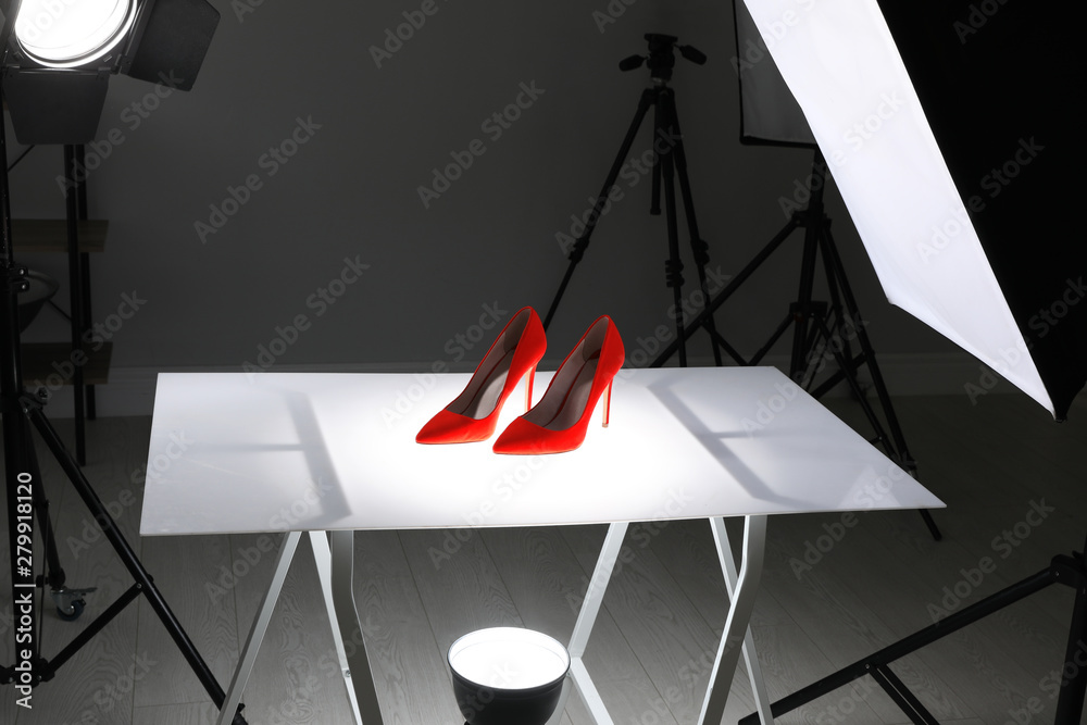 Professional photography equipment prepared for shooting stylish shoes in studio - obrazy, fototapety, plakaty 