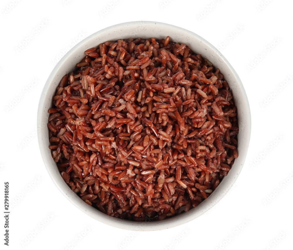 Bowl with delicious cooked brown rice on white background, top view