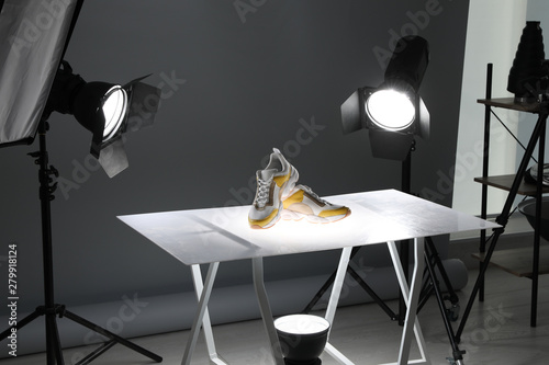 Professional photography equipment prepared for shooting stylish shoes in studio photo