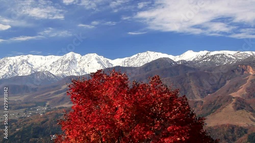 Snowy mountains in autumn photo