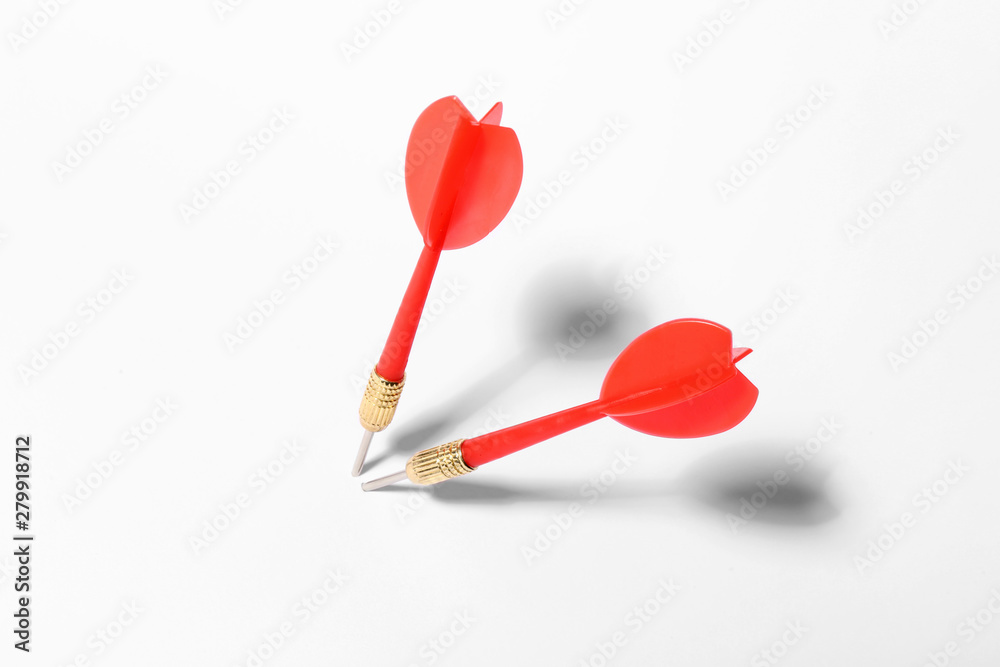Red dart arrows for game on white background Red dart arrows for game on white background