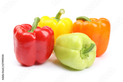 Fresh ripe bell peppers on white background