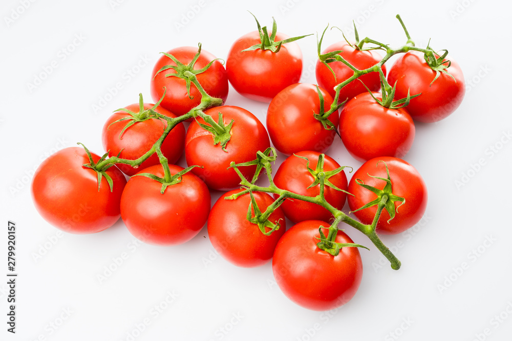 Tomato branch. Tomatoes isolated on white Tomato branch. Tomatoes isolated on white