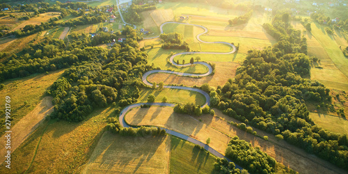 Drone aerial view - windy road in summer photo