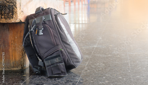 Black bag beside the chair and copy space