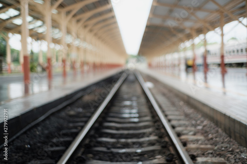 Blurred of railway tracks at train station,abstract for background