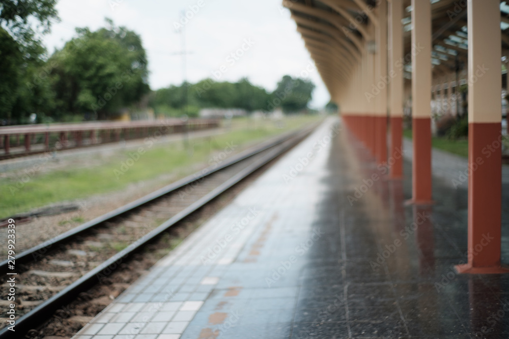 Blurred of railway tracks at train station,abstract for background