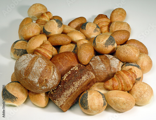 A photograph of a pile of assorted fresh bread