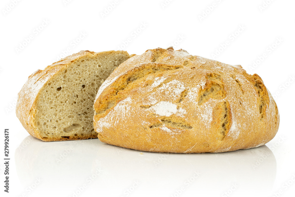 Group of two halves of fresh baked rye wheat bread one cut in two isolated on white background
