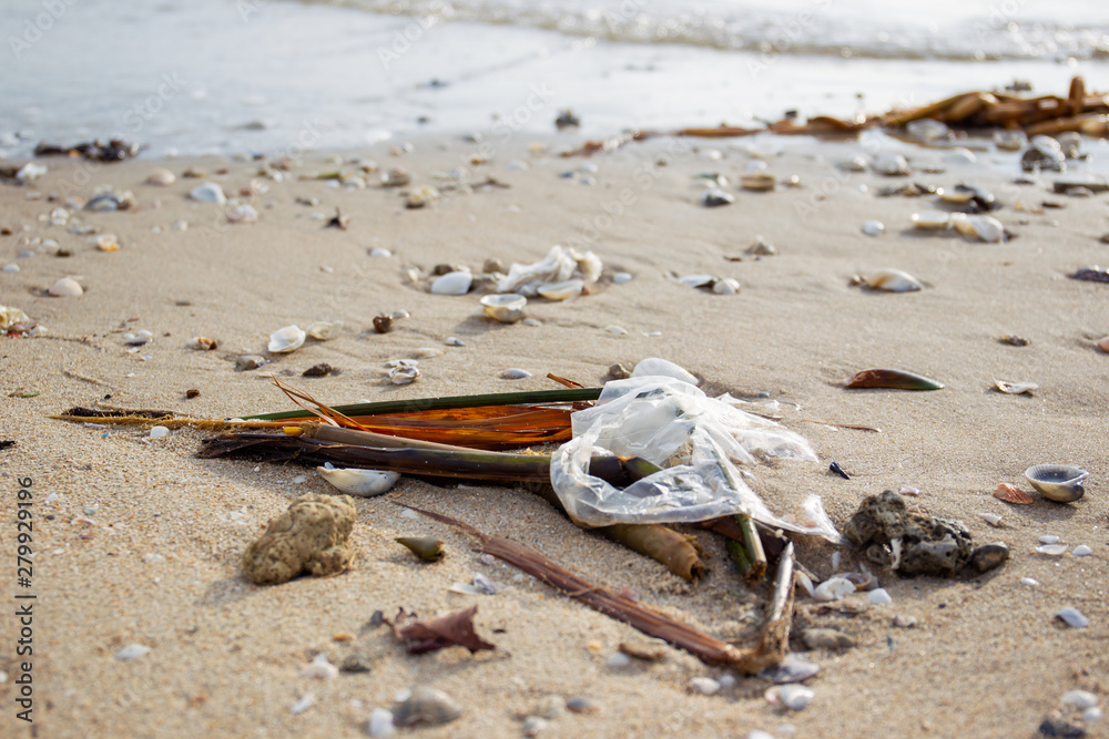 Obraz premium Dirty beach fully with plastic garbage and polluted environment.