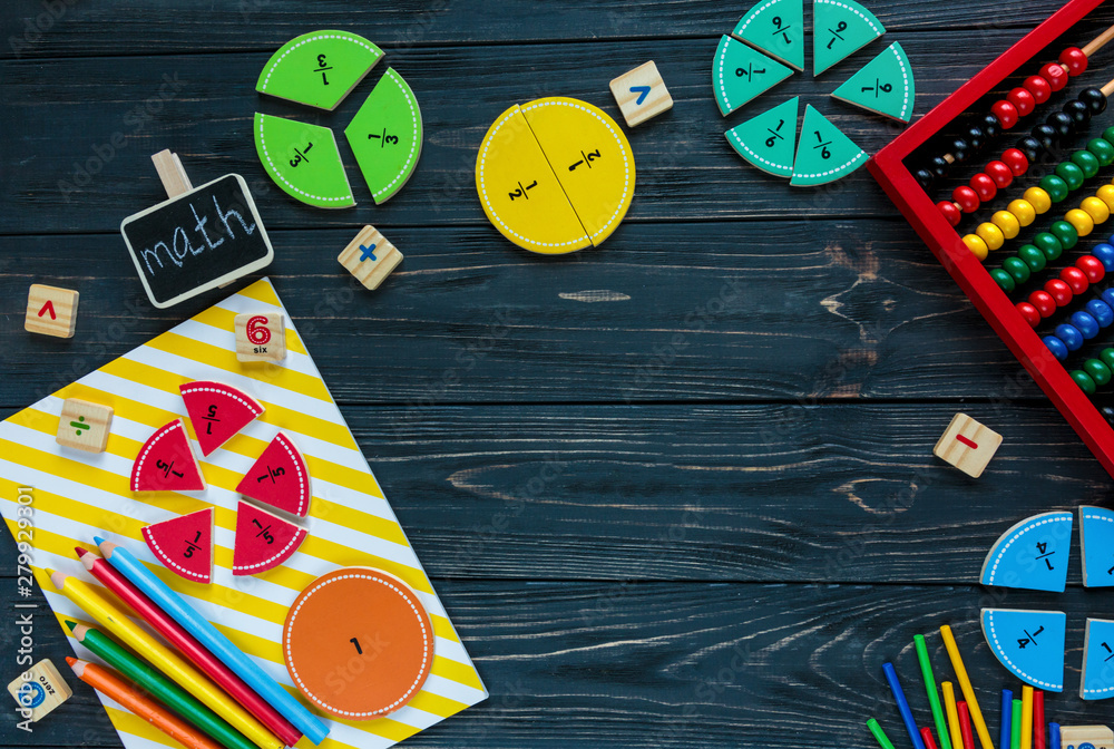 Creative Сolorful math fractions on dark background. Interesting funny math  for kids. Education, back to school concept. Geometry and mathematics  materials. Flat lay, top view Stock Photo | Adobe Stock
