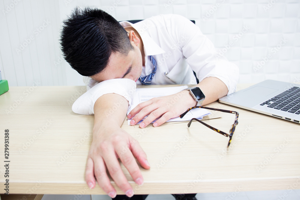 Hard working and health care concept. A business man has a problems from hard working for a long time. Hard working and health care concept. A business man has a problems from hard working for a long time.