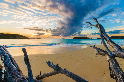 Golden sunset over a sandy beach..