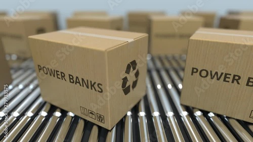 Boxes with power banks on roller conveyors. Loopable 3D animation photo