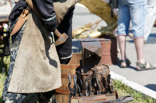 Forge. Blacksmith's tool. Hand-made antique tool for blacksmithing.