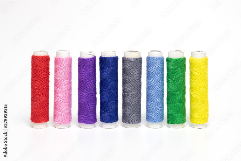 Color sewing threads isolated on white background. Color sewing threads isolated on white background.