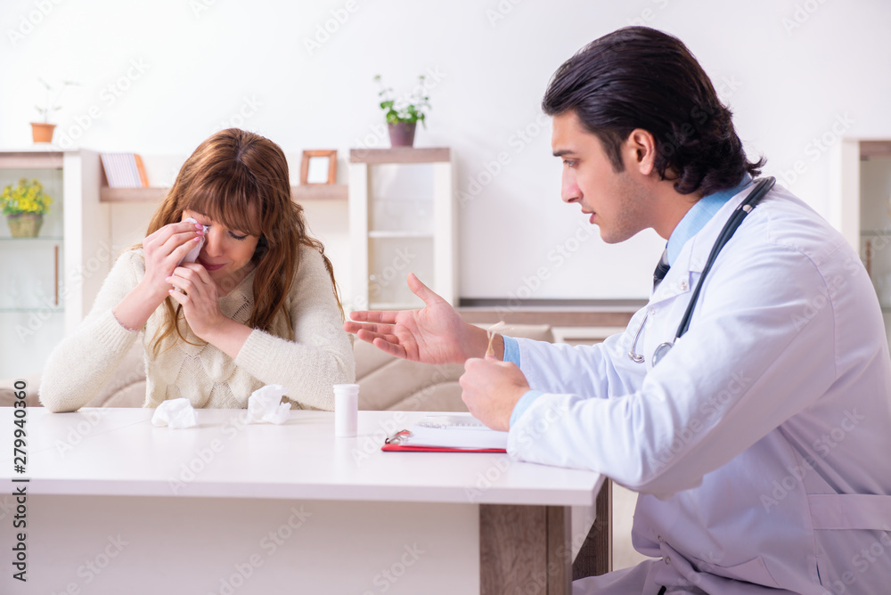 Young female patient discussing with male psychologist personal Young female patient discussing with male psychologist personal