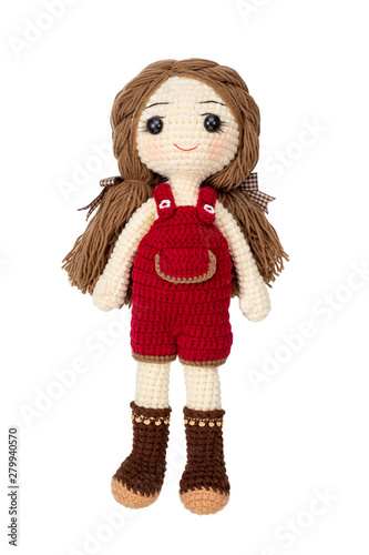 Pretty girl doll crochet by hand make isolated on white background.