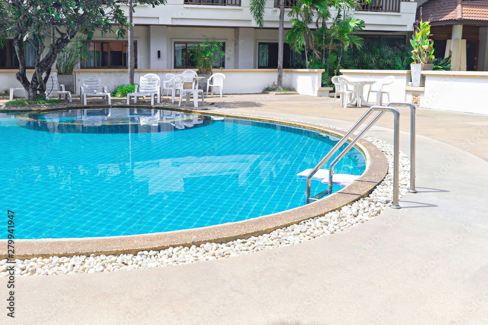 swimming pool with grab bars ladder
