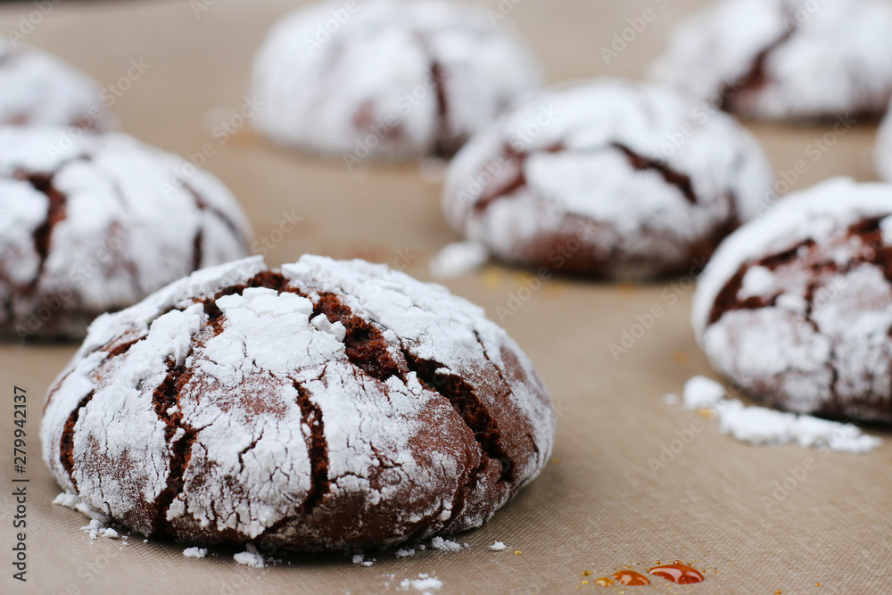 Chocolate cookies with cracks close up. dessert concept. cookies for holidayand christmas Chocolate cookies with cracks close up. dessert concept. cookies for holidayand christmas